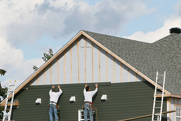 Professional Siding technician working in Lake Helen, FL
